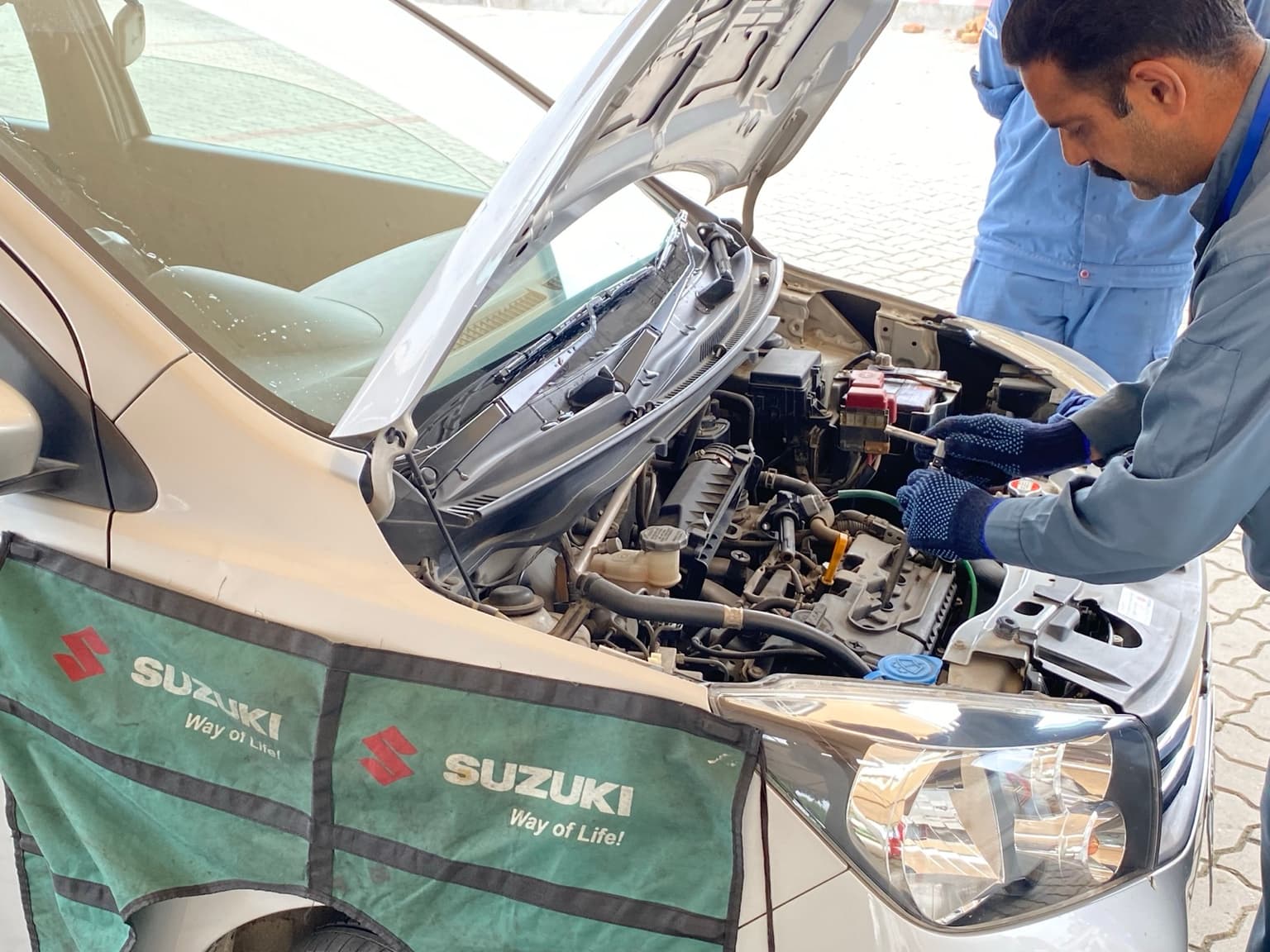 Our certified Suzuki technician at work in the workshop